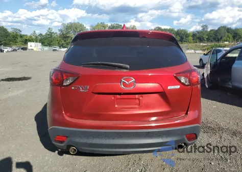 2014 Mazda Cx-5 Touring z USA, uszkodzony, nr VIN JM3KE4CYXE0364931